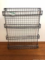 Front view of metal four-tier rack