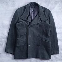 Front view of grey double-breasted pea coat
