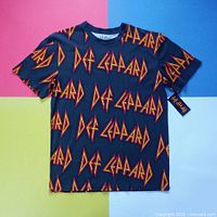 Front view of black Def Leppard graphic T-shirt with hang tag visible