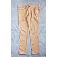 Full front view of tan Free People jeans