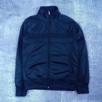 Full front view of black Nike zip-up jacket