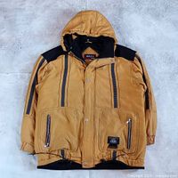 Full front view of yellow Maxx Antarctic Line jacket showing color, design, pockets, hood and overall condition