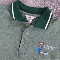 Front upper view showing collar, placket, embroidery