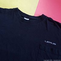Close view of upper front showing Lexus embroidery and pocket