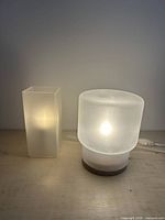 Both lamps lit to show working condition and frosted glass appearance