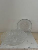 Both clear bowls side by side showing overall designs and relative sizes