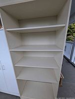 Open shelving unit with four shelves