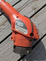 Close-up of Black & Decker GrassHog label and motor housing