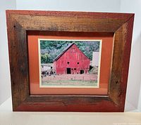 Framed photograph front view within rustic barn wood frame