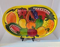 Front view of entire oval fruit bowl on stand