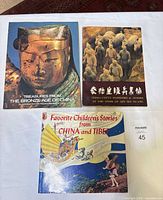 Front covers of all three books displayed side by side