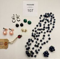 Full lot overview showing necklace and six earring pairs