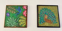 Both framed paintings side by side