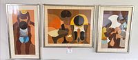 Front view of all three framed serigraphs on wall