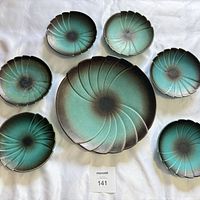 Top view of full 7-piece set displaying glaze and spiral pattern