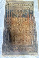 Full view of entire rug showing overall design and condition