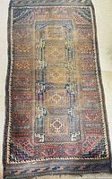 Full view of entire rug showing pattern and borders