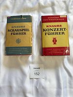 Front covers of both Knaurs hardcover books with lot tag 152