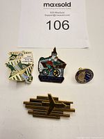Group shot of all four pins