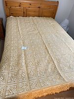 Coverlet spread on queen bed full view