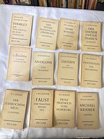 All 12 Reclam books laid out showing covers
