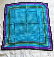 Full view of scarf showing pattern, colors, and edges