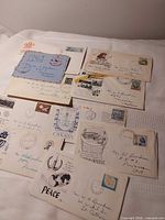 All ten first-day covers laid out, variety of stamps visible