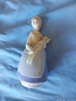 Front view of porcelain girl figurine