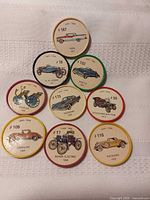 Front view of all nine Jell-O collector wheels arranged on cloth