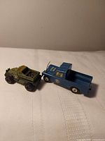 Both diecast vehicles side by side showing overall condition and scale
