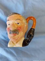 Front of hand-painted character mug