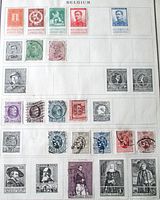 Full album page showing multiple Belgian stamps in rows