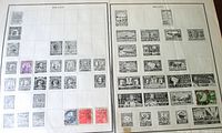 Two album pages filled with assorted Brazil stamps