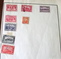 Full album page showing all nine stamps affixed