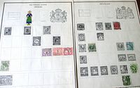 Both Scott album pages side-by-side, showing Netherlands and Denmark stamps