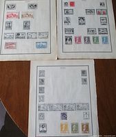 Overview of three album pages with Spain stamps