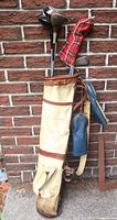 Full view of Spalding canvas and leather golf bag loaded with clubs