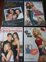 All four DVD cases front covers visible
