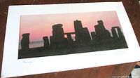 Full view of matted Stonehenge sunrise photograph
