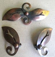 Brooch and both earrings displayed