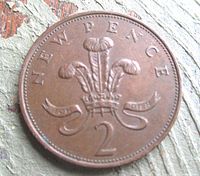 Reverse showing Prince of Wales feathers, NEW PENCE legend and denomination 2