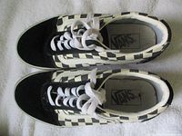 Top view of both shoes showing checkerboard uppers and laces