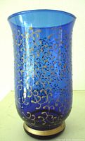 Full front view of cobalt blue gold-enameled footed vase