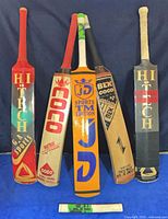 Front view showing all five bats and slide grip