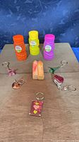 All items laid out including three bubble bottles, four keychains, two chalk sticks