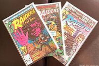 Front view of all three Raiders of the Lost Ark comics in bags and boards