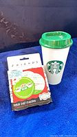 Starbucks tumbler and Friends coaster set front view