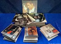 Group shot of all jewel case CDs and Piolo Pascual photo card set