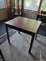 Table in closed position, showing overall condition