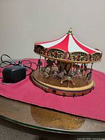 carousel with power adapter overall view